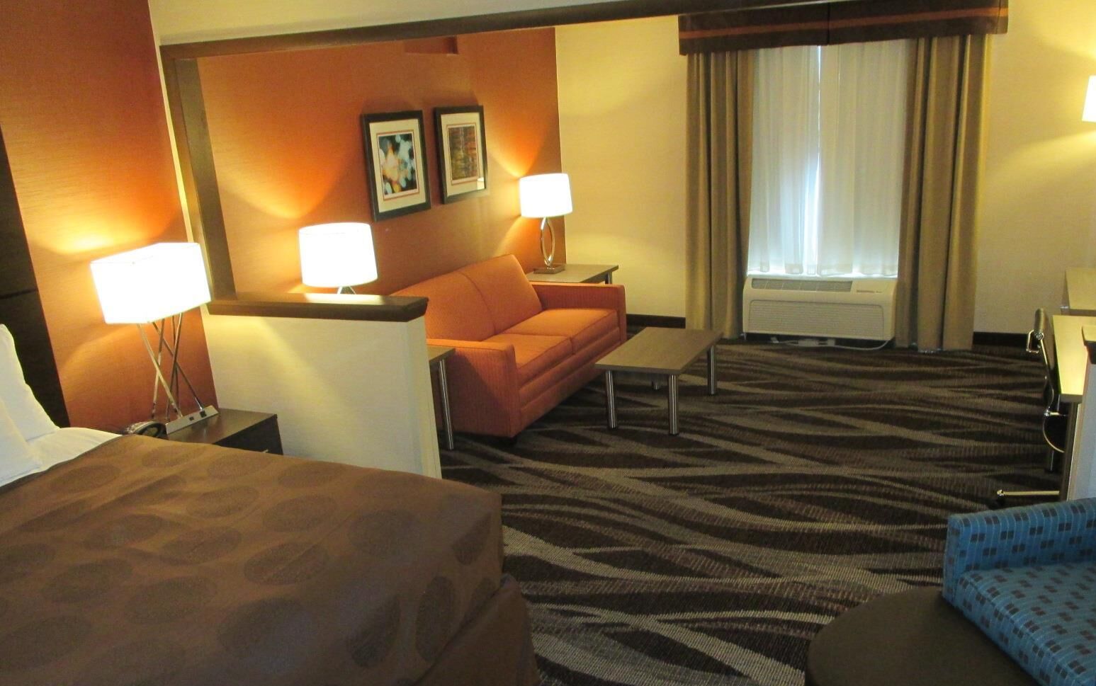 Desk, laptop workspace, blackout drapes, iron/ironing board