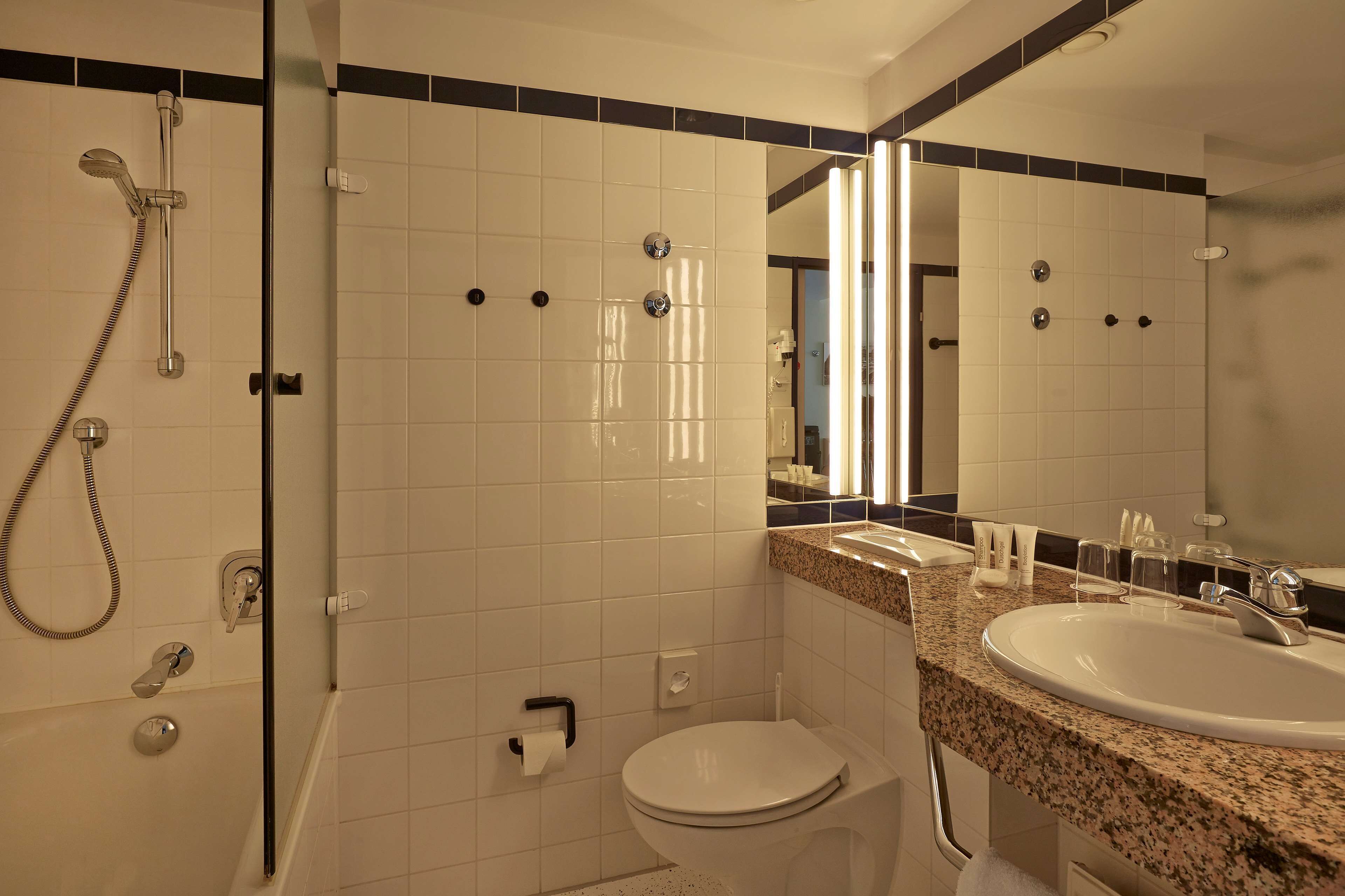 shower, eco-friendly toiletries, hair dryer, towels