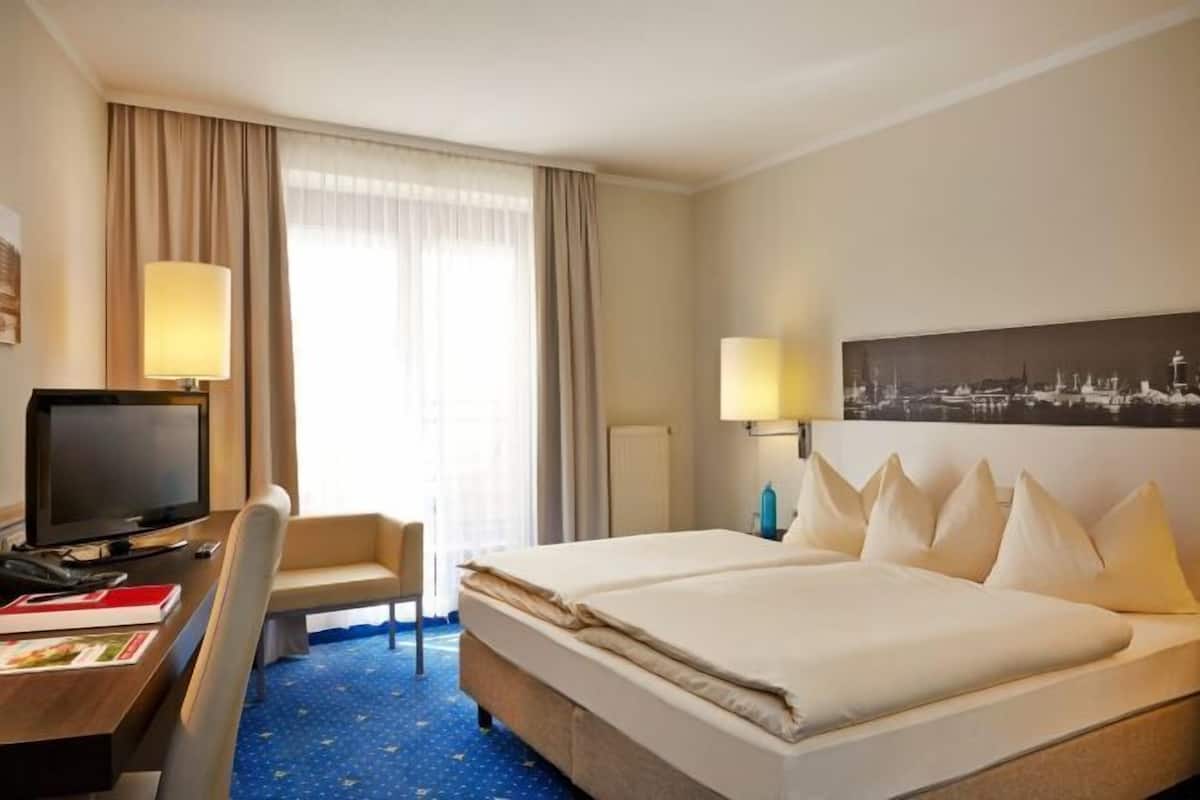 Desk, iron/ironing board, free WiFi, bed sheets
