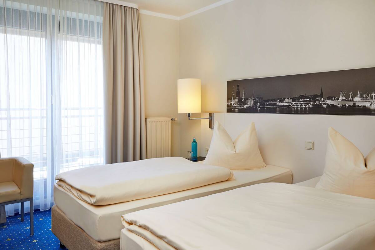 Standard Twin Room | Desk, iron/ironing board (on request), free WiFi, bed sheets