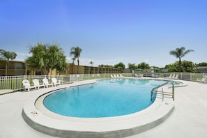 Outdoor pool, open 7:00 AM to 8:00 PM, pool loungers