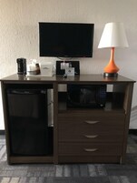 Blackout drapes, iron/ironing board, free cribs/infant beds