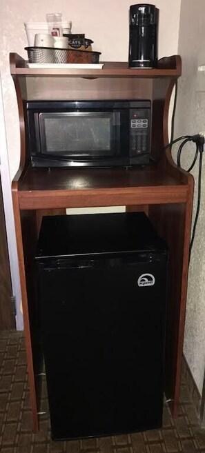 Blackout drapes, iron/ironing board, free cribs/infant beds