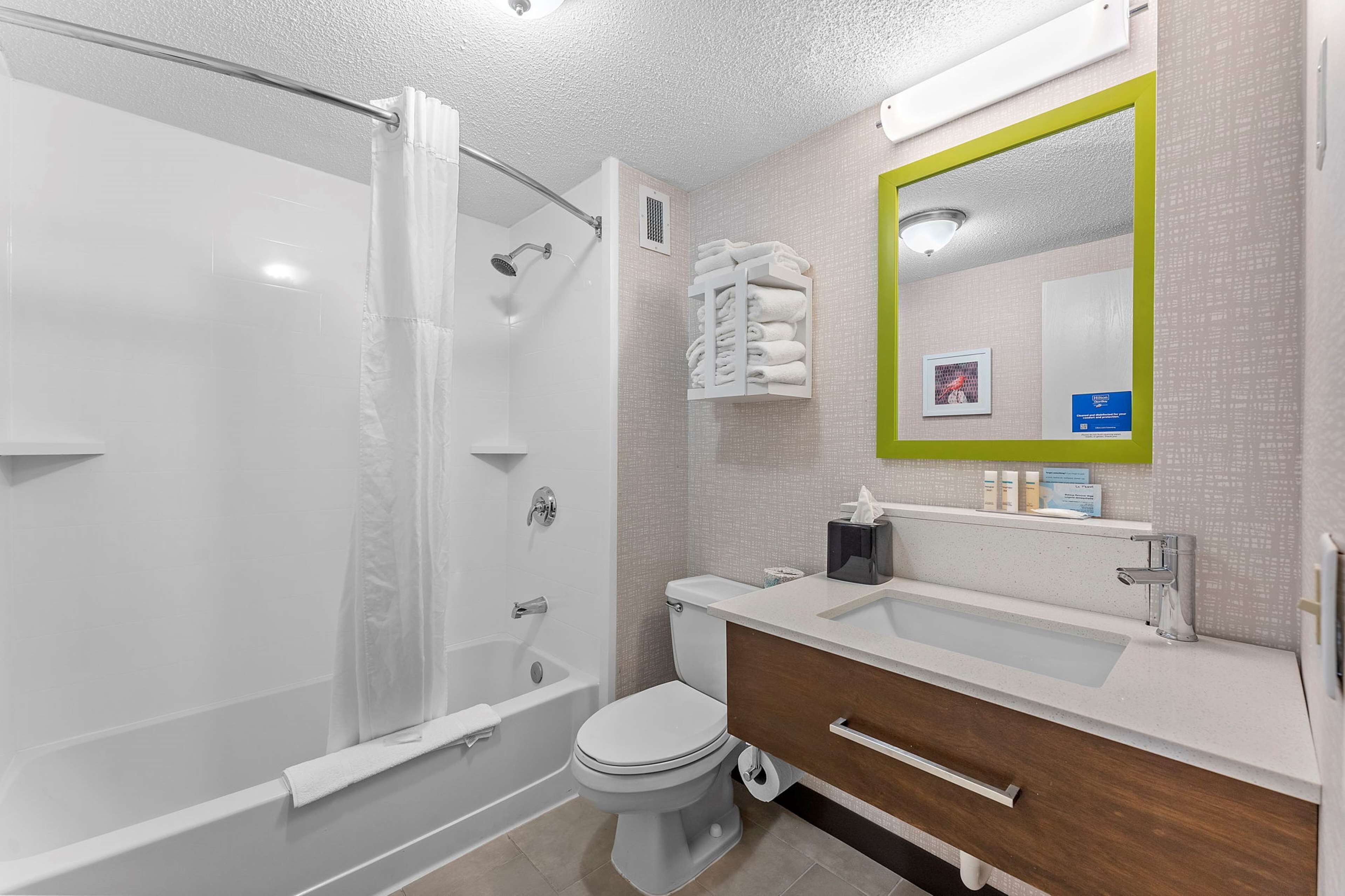 combined shower/bathtub, eco-friendly toiletries, hair dryer, towels