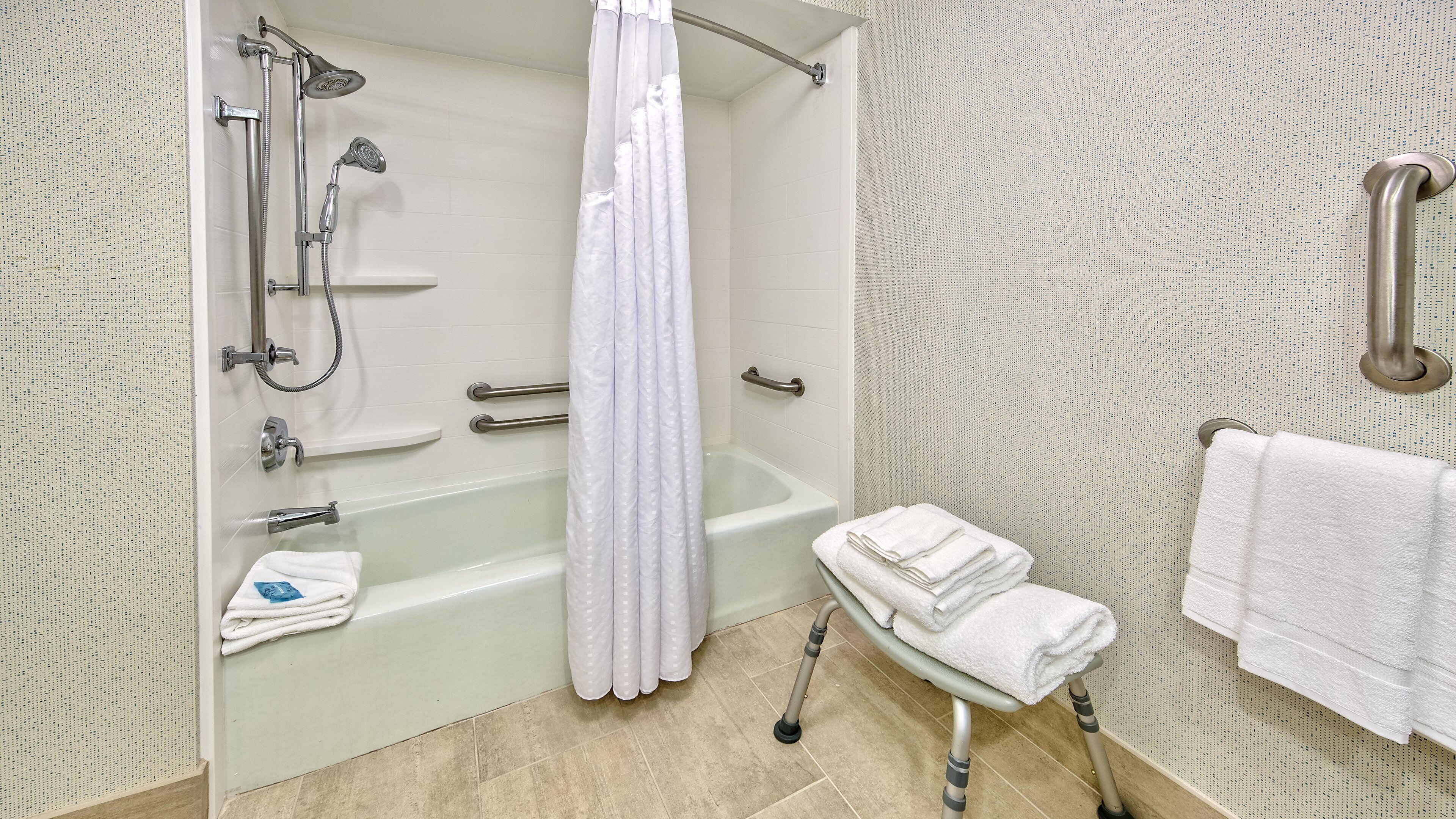 standard room, 2 double beds, accessible bathtub (mobility tub) | bathroom | combined shower/bathtub, eco-friendly toiletries, hair dryer, towels