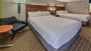 Down comforters, pillowtop beds, in-room safe, desk
