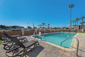 Outdoor pool, open 9:00 AM to 10:00 PM, pool umbrellas, sun loungers