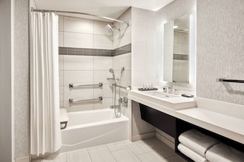Rainfall showerhead, designer toiletries, hair dryer, towels at San Francisco Marriott Marquis