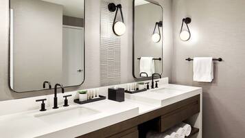 Suite, 1 King Bed | Bathroom | Rainfall showerhead, designer toiletries, hair dryer, towels