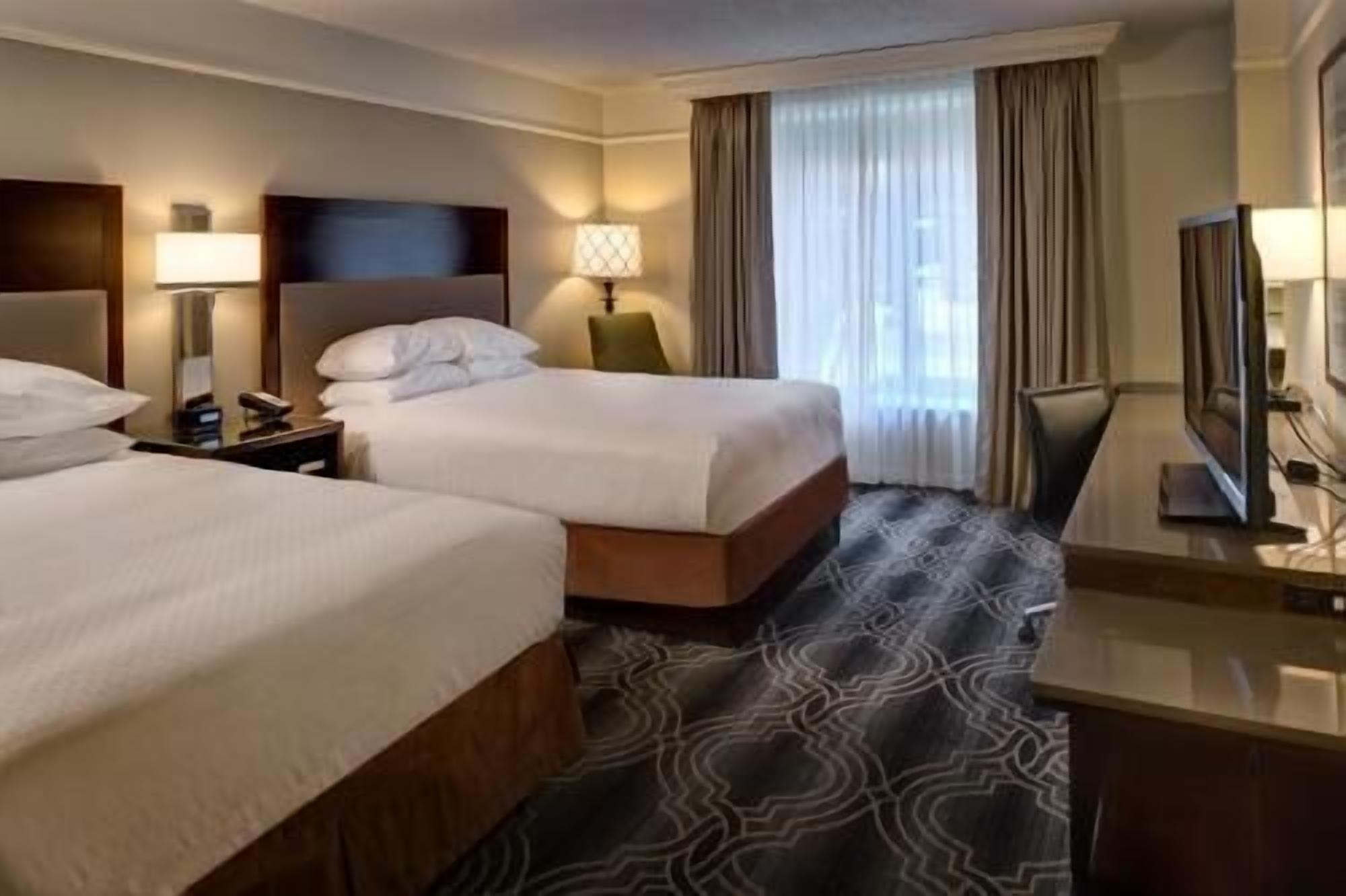 Premium bedding, in-room safe, laptop workspace, blackout drapes