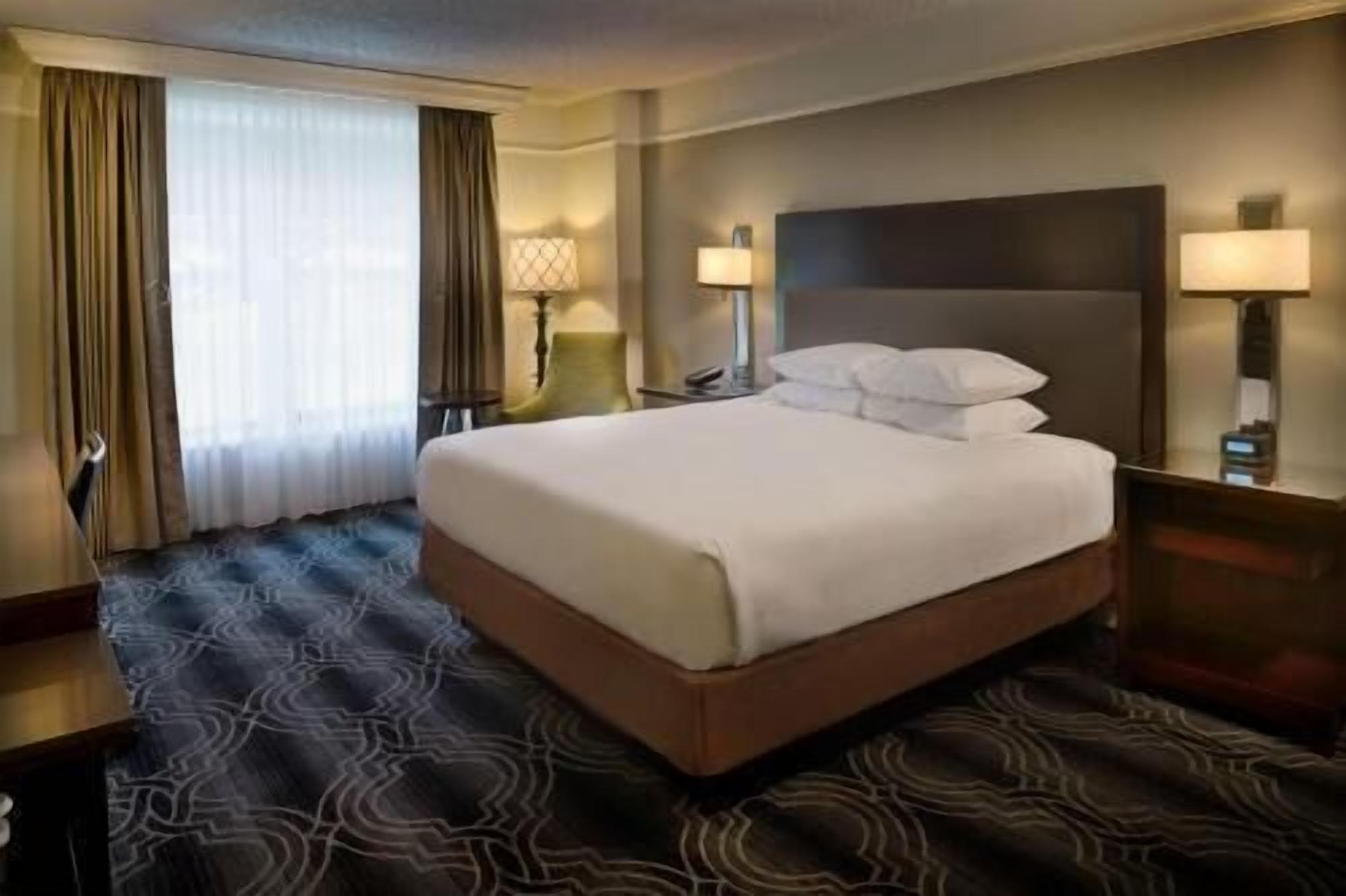 Premium bedding, in-room safe, laptop workspace, blackout drapes