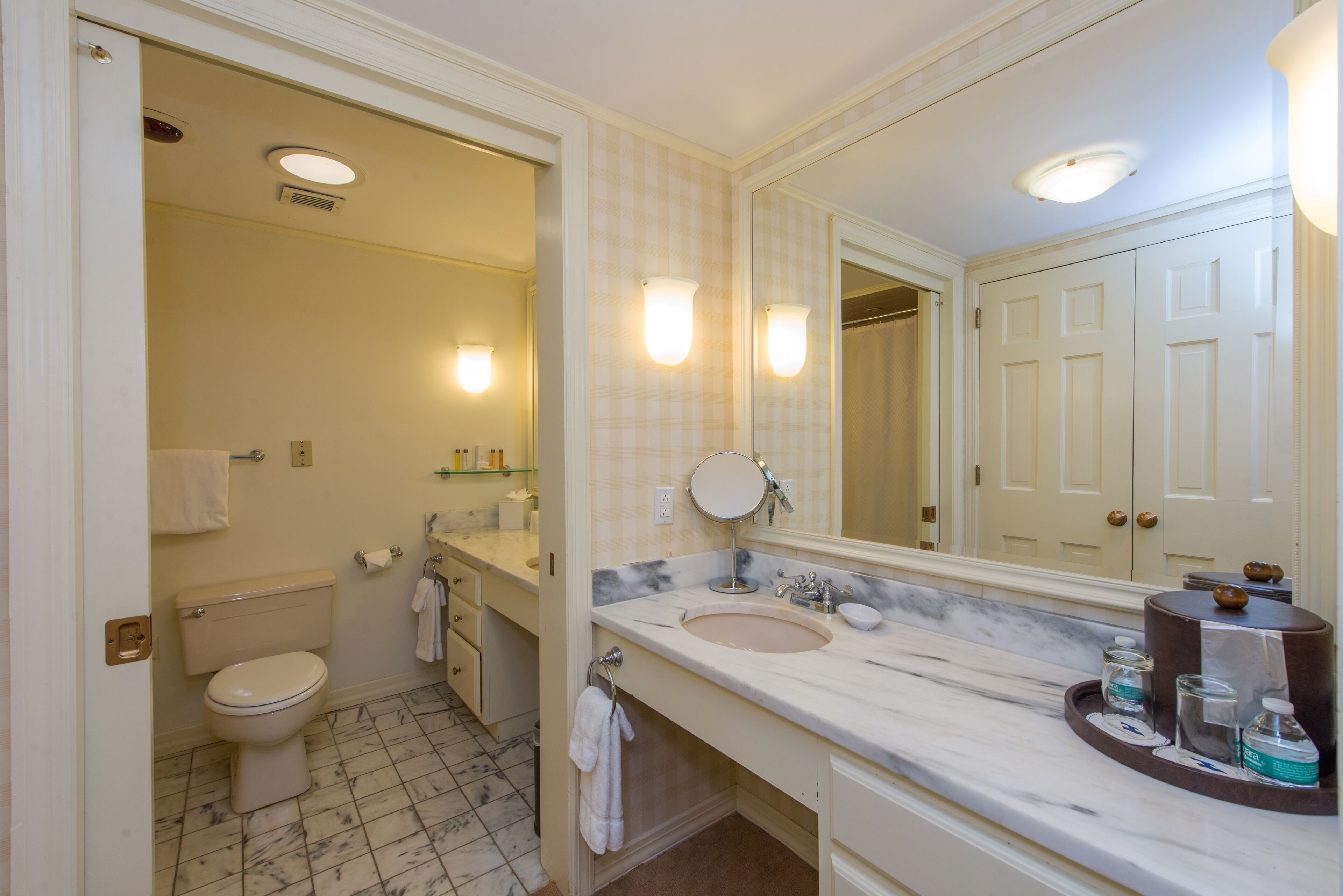 designer toiletries, hair dryer, bathrobes, towels