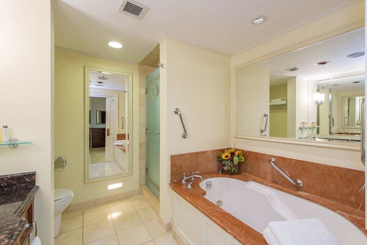 designer toiletries, hair dryer, bathrobes, towels