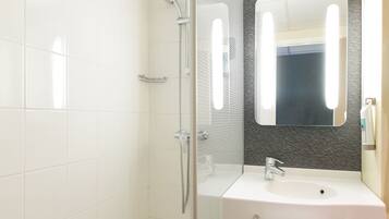 Eco-friendly toiletries, hair dryer, towels