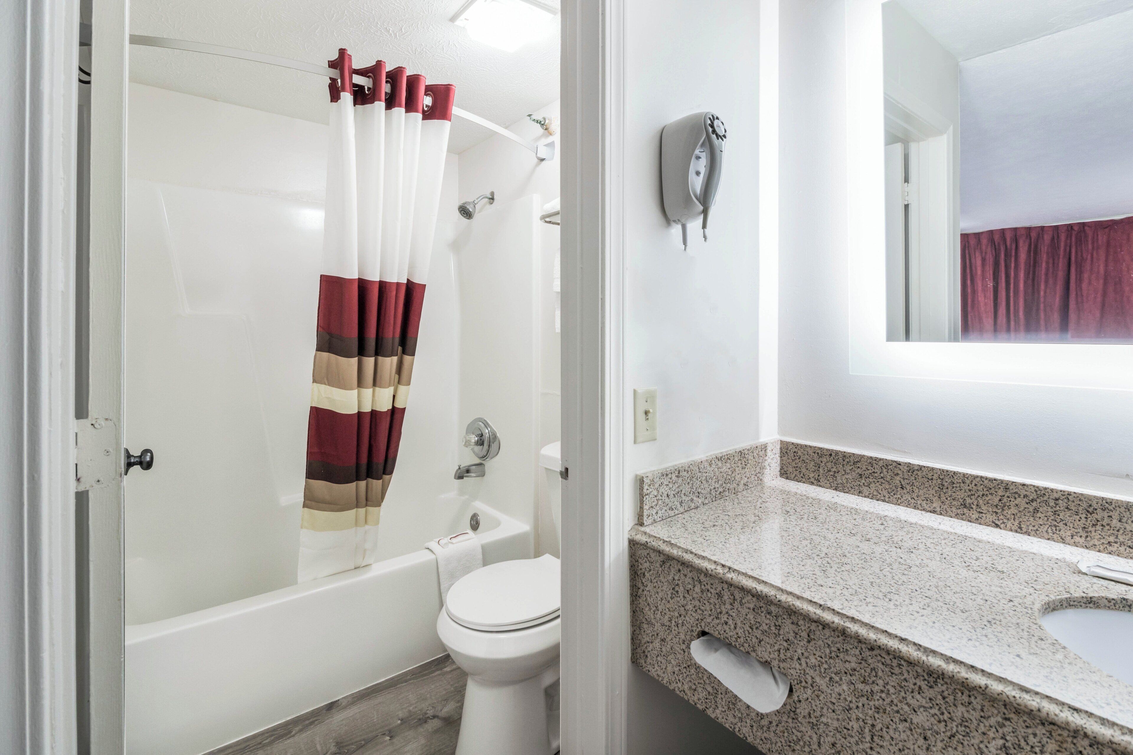Superior Room, 1 King Bed, Non Smoking (Refrigerator & Microwave) | Bathroom | Bathtub, eco-friendly toiletries, hair dryer, towels
