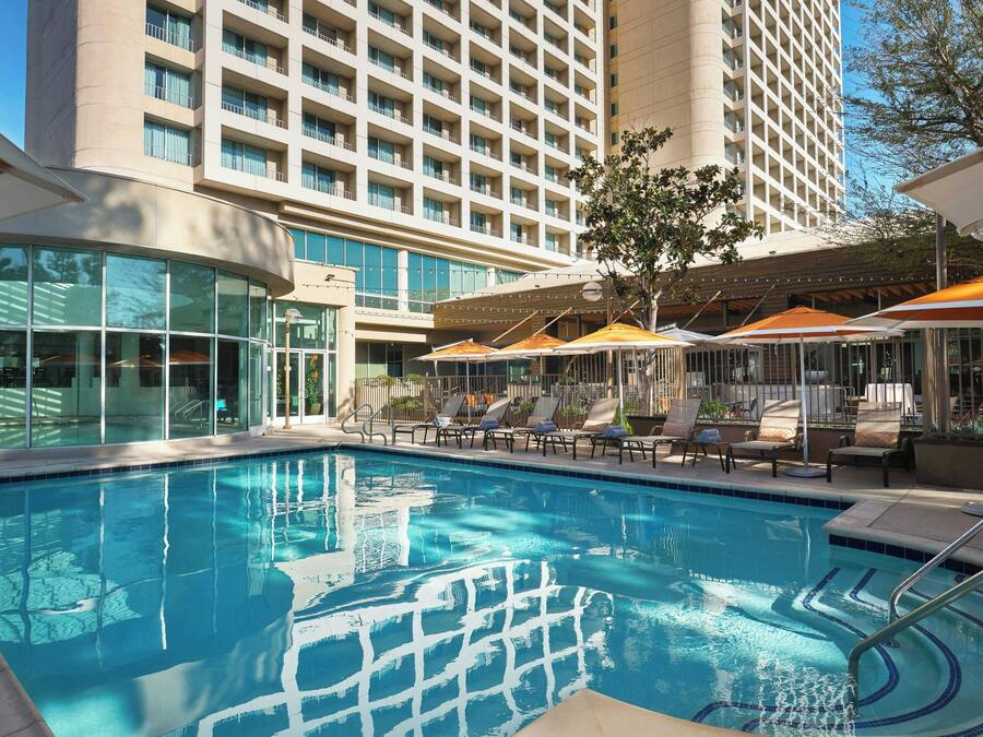 Indoor pool, outdoor pool, open 6:00 AM to 10:00 PM, pool umbrellas