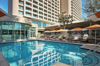 Indoor pool, outdoor pool, open 6:00 AM to 10:00 PM, pool umbrellas at Warner Center Marriott Woodland Hills