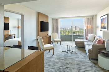 Premium bedding, down comforters, desk, laptop workspace at Warner Center Marriott Woodland Hills
