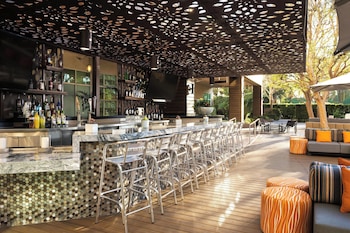 Indoor pool, outdoor pool, open 6:00 AM to 10:00 PM, pool umbrellas at Warner Center Marriott Woodland Hills