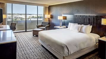 Hypo-allergenic bedding, down duvets, pillow-top beds, in-room safe