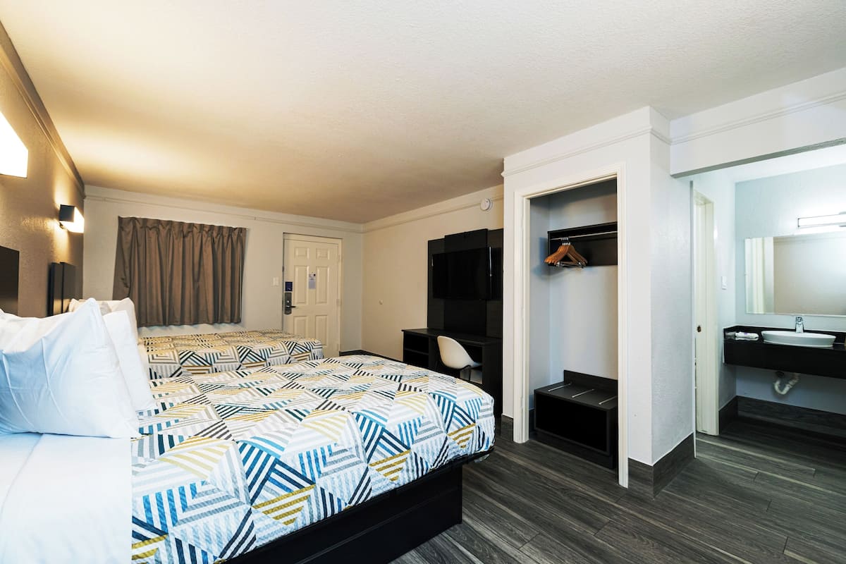 Desk, laptop workspace, free WiFi, bed sheets