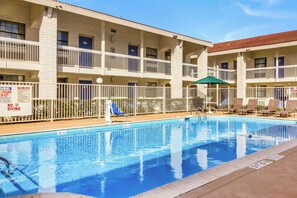 Seasonal outdoor pool, pool umbrellas, pool loungers