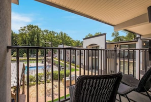 Seasonal outdoor pool, open 9:00 AM to 9:00 PM, pool loungers