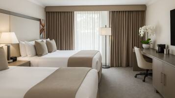 Pillowtop beds, in-room safe, desk, laptop workspace