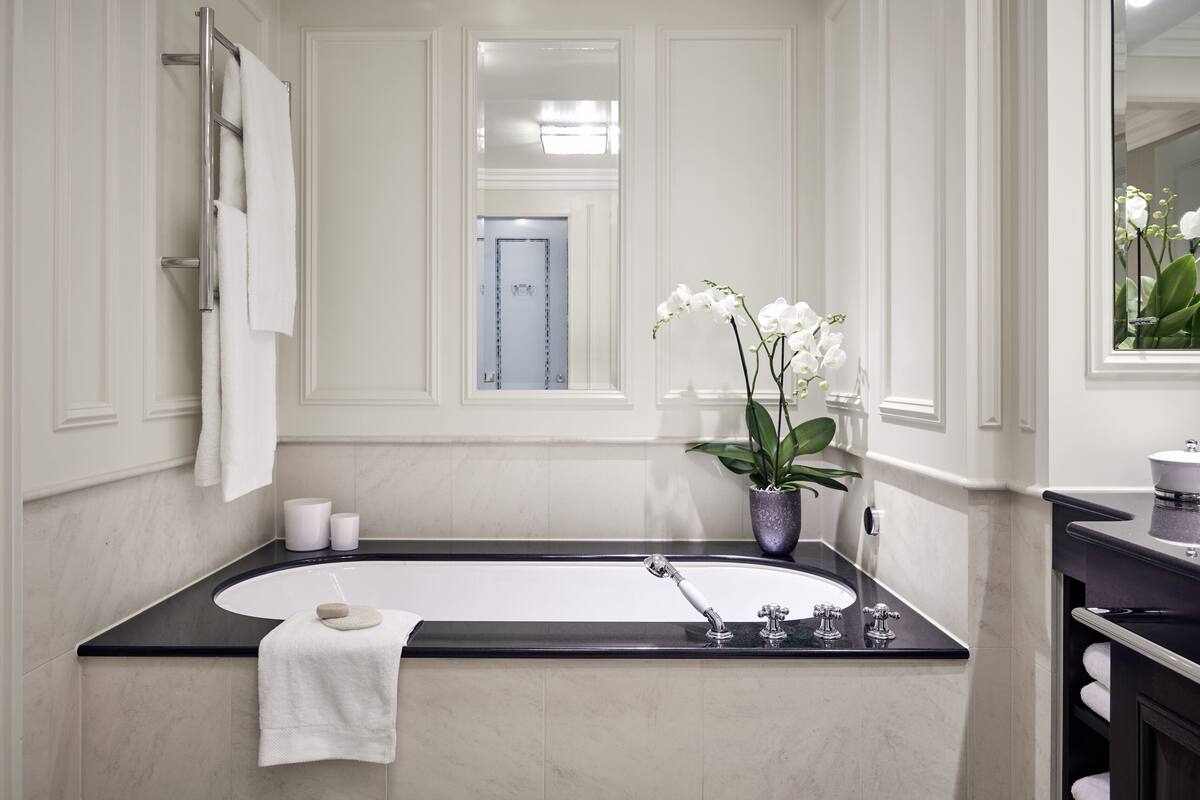 separate bathtub and shower, deep-soaking bathtub, rainfall showerhead