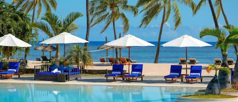 Outdoor pool, pool umbrellas, sun loungers