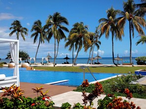 Outdoor pool, pool umbrellas, pool loungers