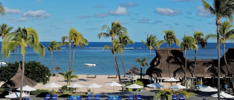 Outdoor pool, pool umbrellas, sun loungers