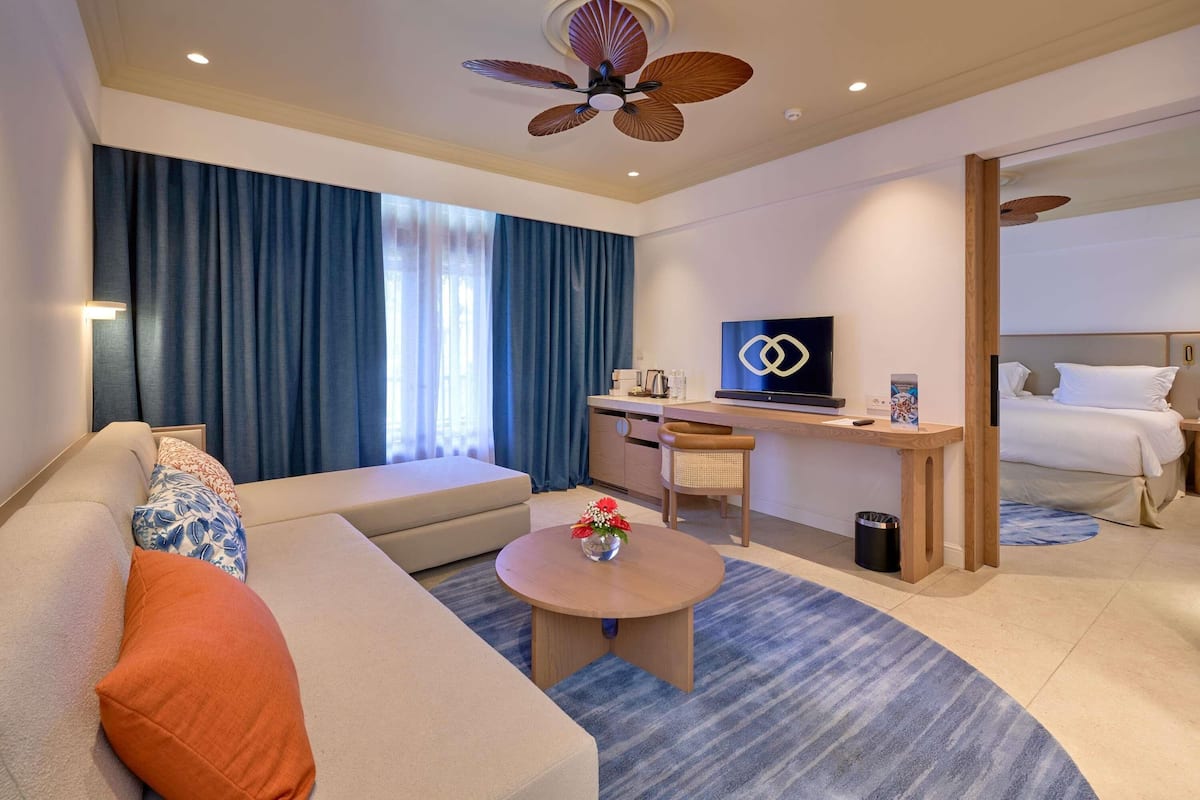 Suite, 1 King Bed, Balcony, Garden View (Prestige) | Minibar, in-room safe, desk, blackout drapes