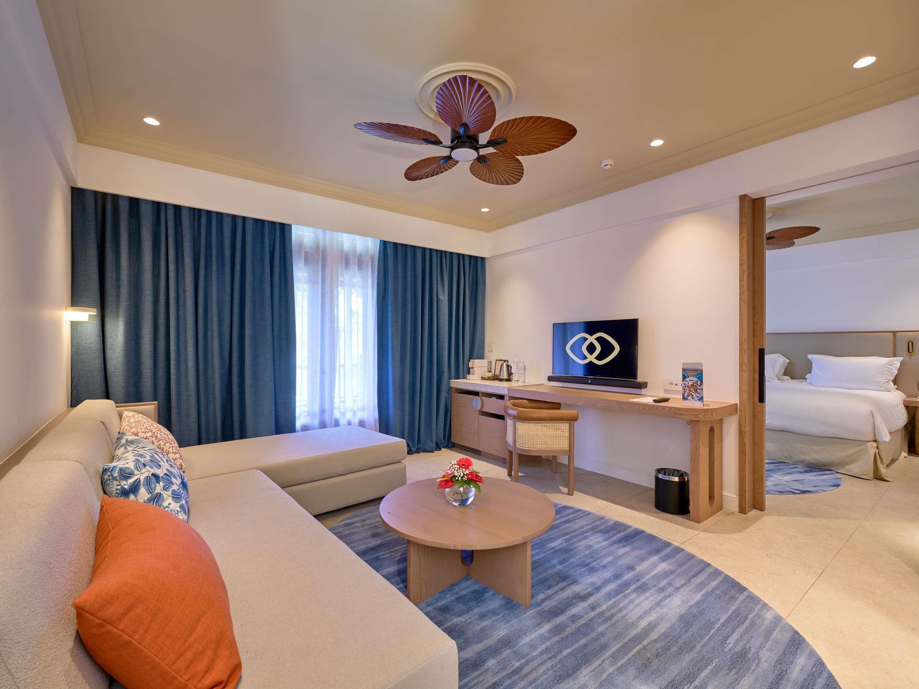 Suite, 1 King Bed, Balcony, Garden View (Prestige) | Minibar, in-room safe, desk, blackout drapes