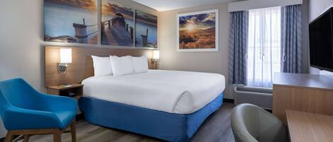 Desk, laptop workspace, iron/ironing board, free cribs/infant beds