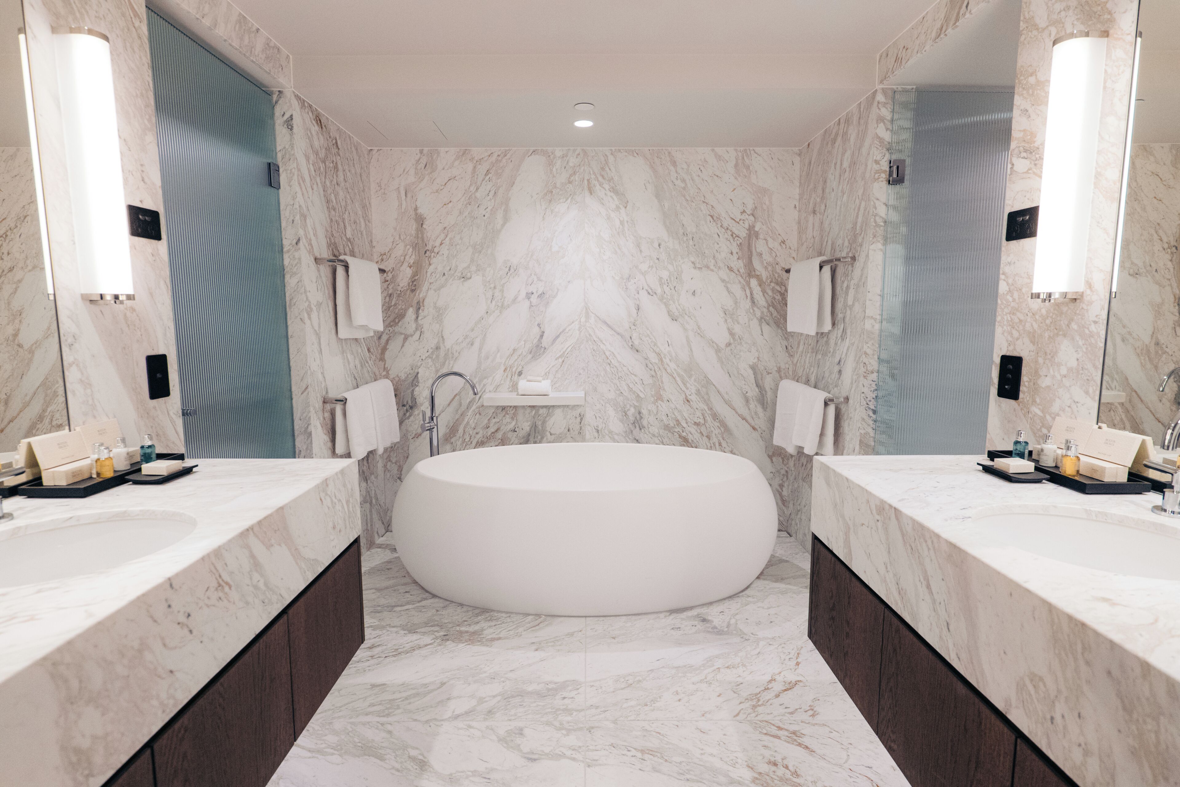domain suite | bathroom | designer toiletries, hair dryer, bathrobes, slippers