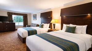 Suite, 2 Queen Beds, Non Smoking | In-room safe, desk, laptop workspace, iron/ironing board - Sturgis Lodge & Suites, Travelodge by Wyndham (Sturgis)