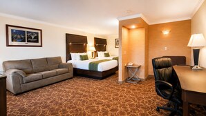 Suite, 2 Queen Beds, Non Smoking | In-room safe, desk, laptop workspace, iron/ironing board - Sturgis Lodge & Suites, Travelodge by Wyndham (Sturgis)