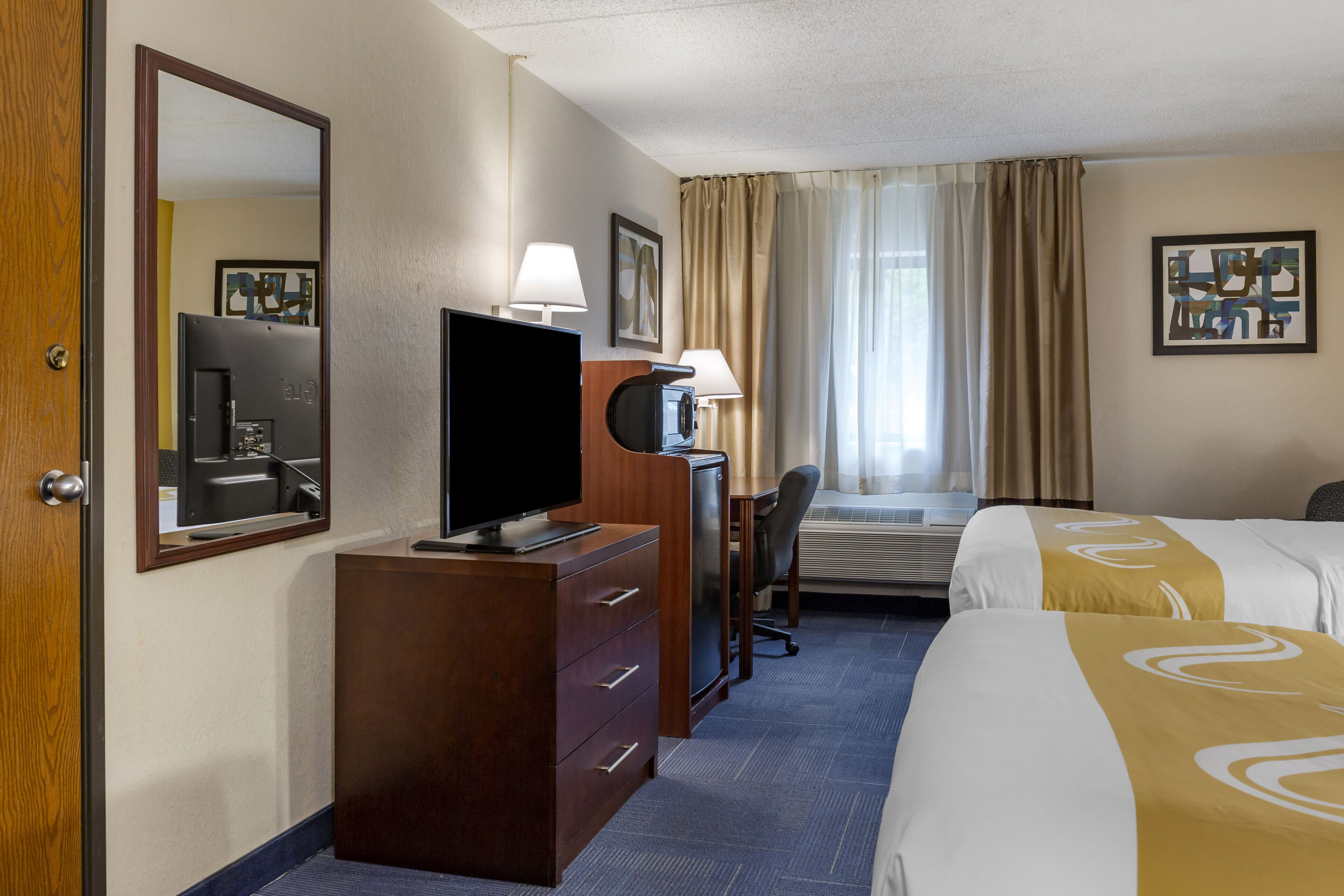 standard room, 2 queen beds, non smoking | in-room safe, individually furnished, desk, iron/ironing board