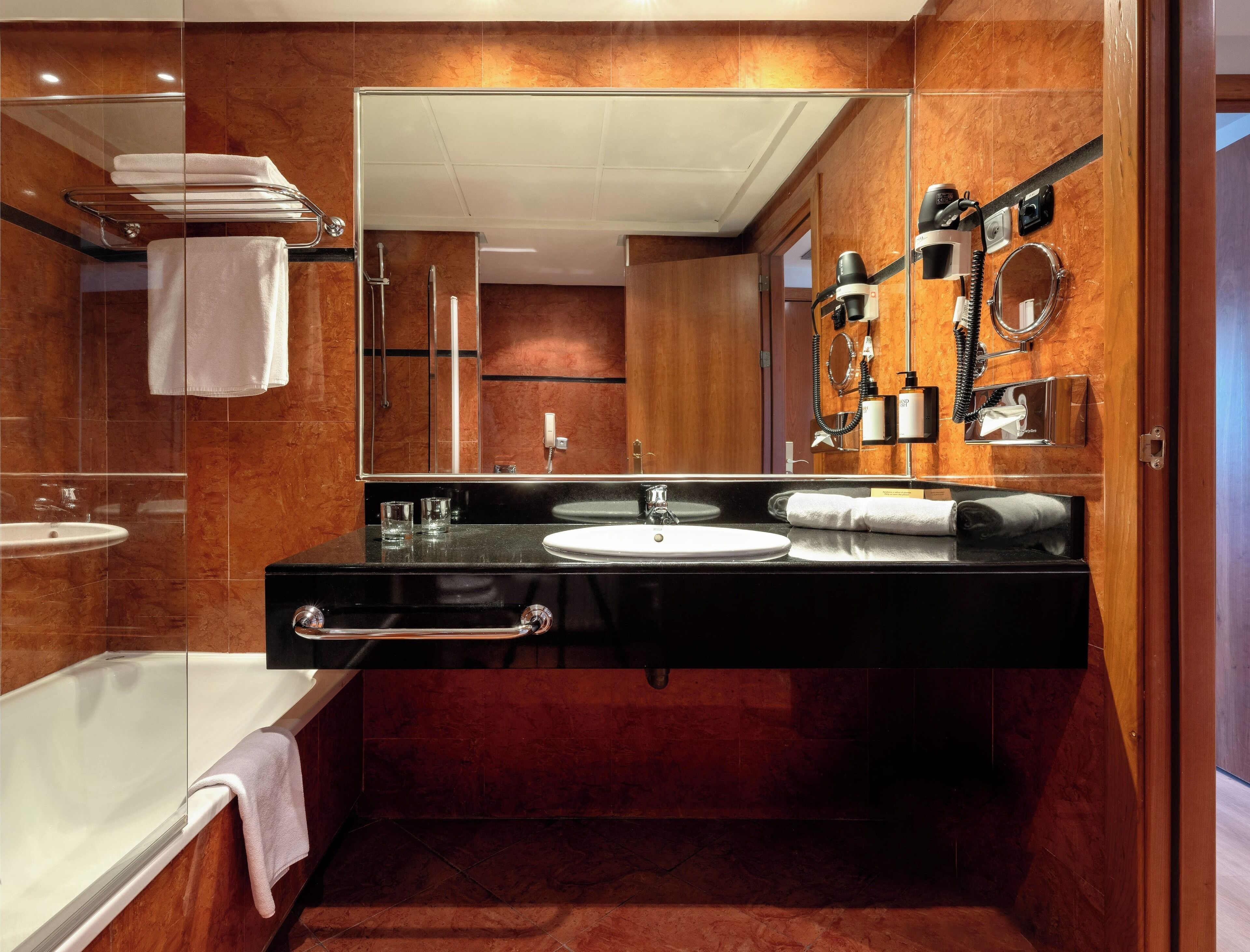 eco-friendly toiletries, hair dryer, bidet, towels