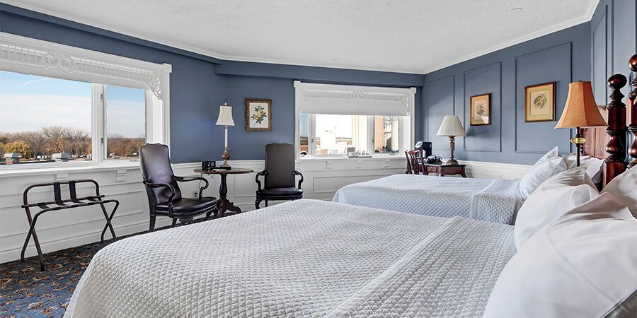 Premium 2 Queen Riverside | Premium bedding, in-room safe, individually decorated, desk