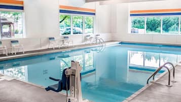 Indoor pool, open 7:00 AM to 10:00 PM, pool umbrellas, pool loungers