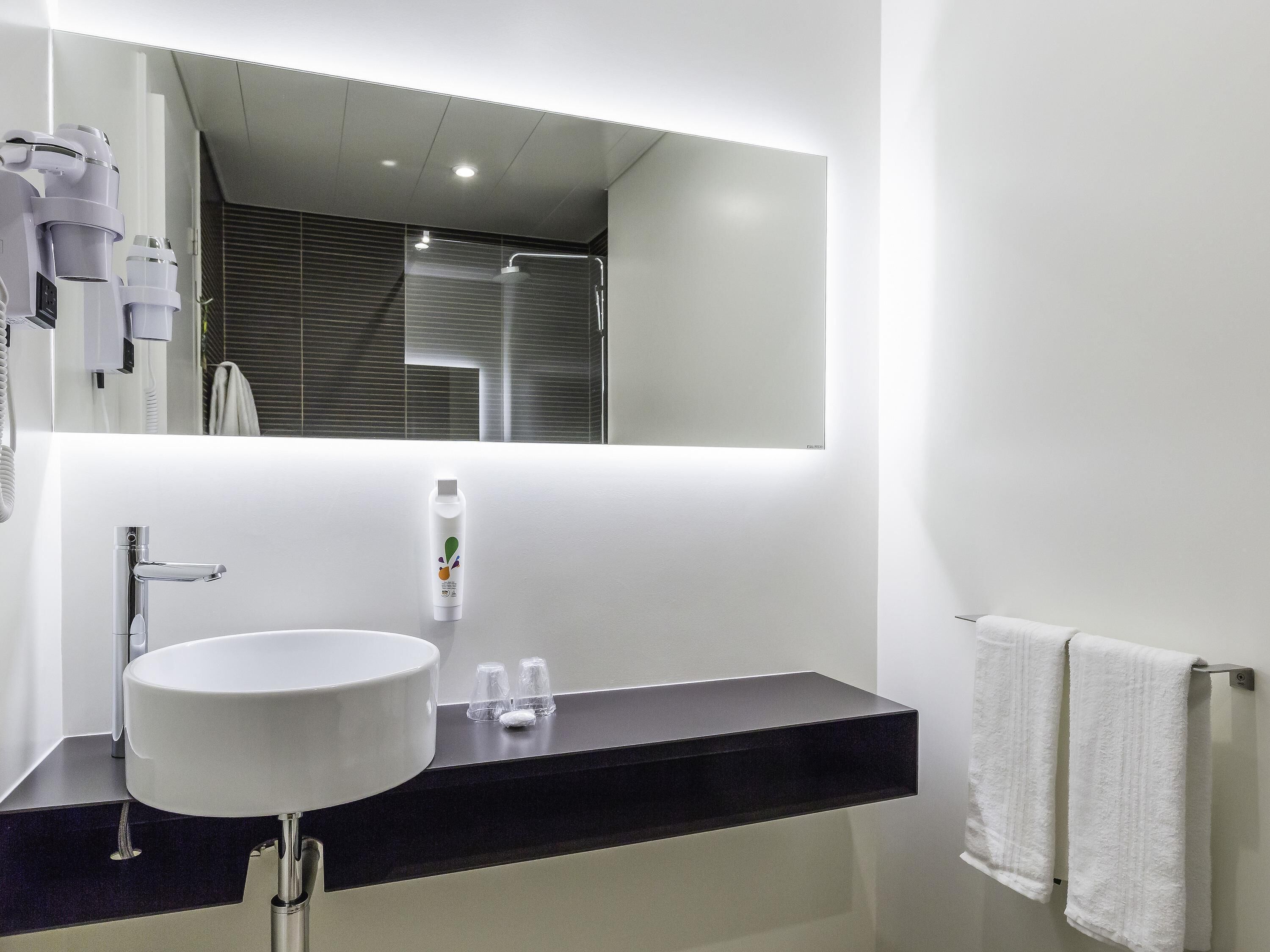 premium bedding, down duvets, select comfort beds, in-room safe