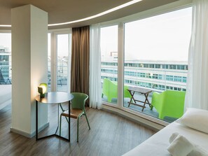 Premium bedding, down comforters, Select Comfort beds, in-room safe