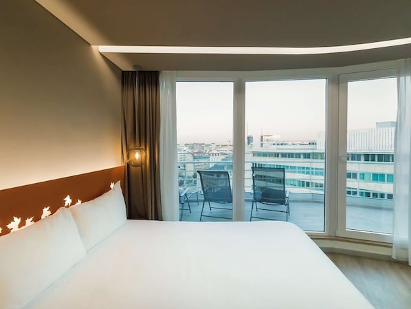 Premium bedding, down comforters, Select Comfort beds, in-room safe