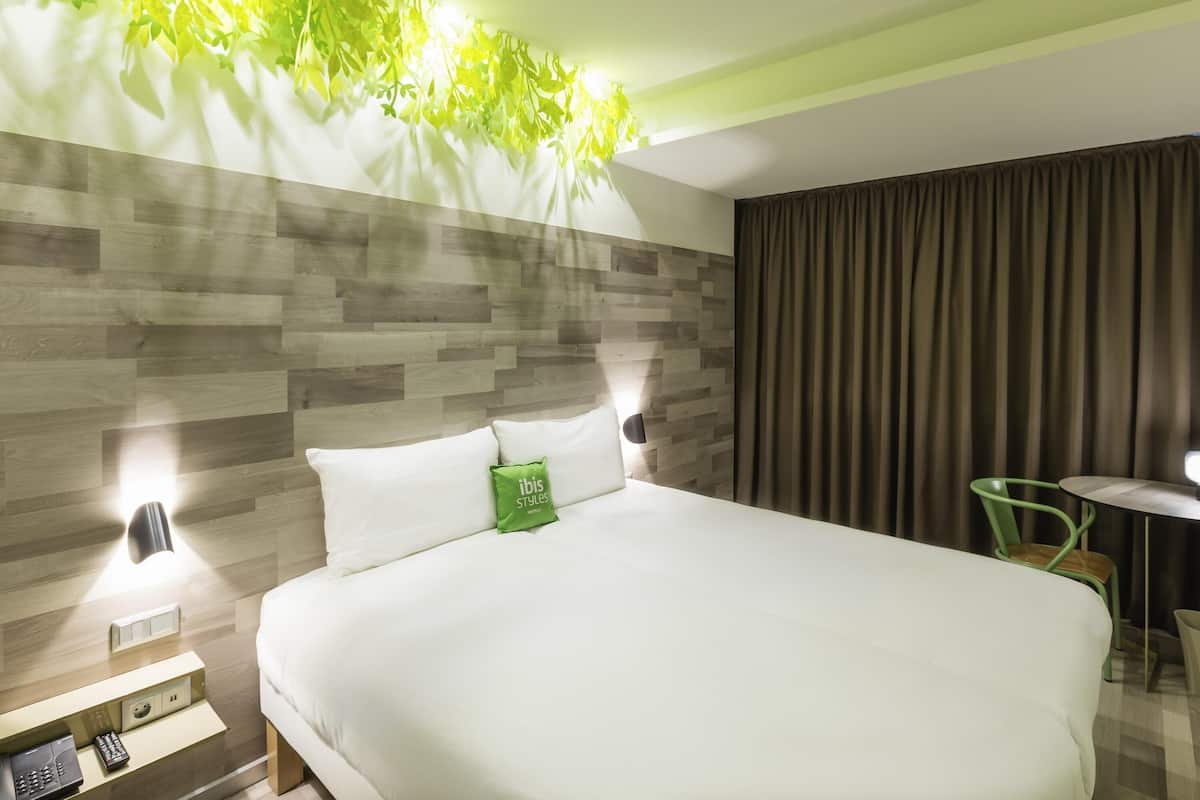 Premium bedding, down duvets, Select Comfort beds, in-room safe