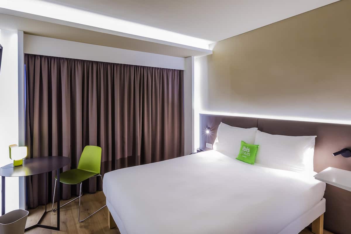 Premium bedding, down duvets, Select Comfort beds, in-room safe