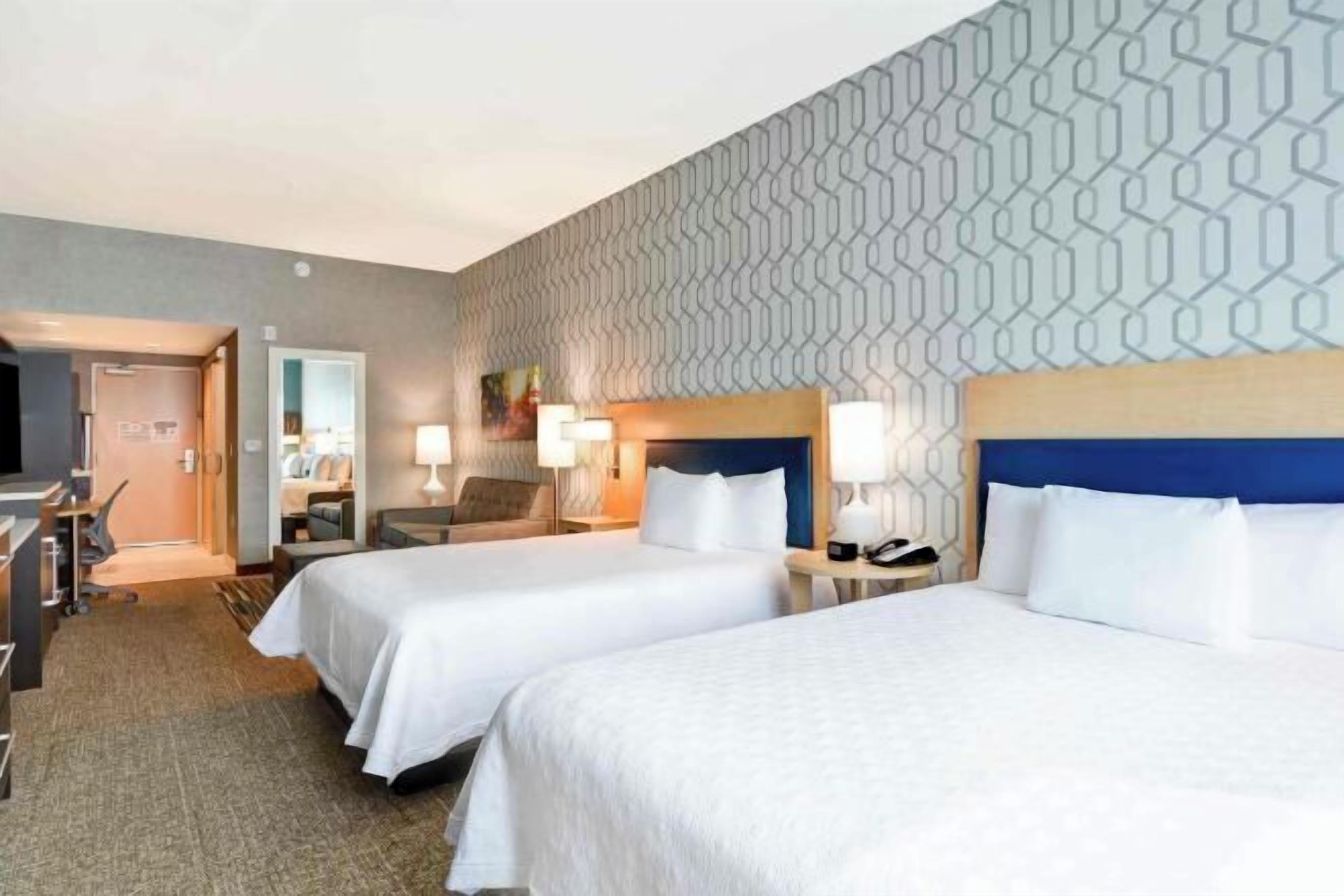 Literie hypoallergénique, coffres-forts dans les chambres, bureau