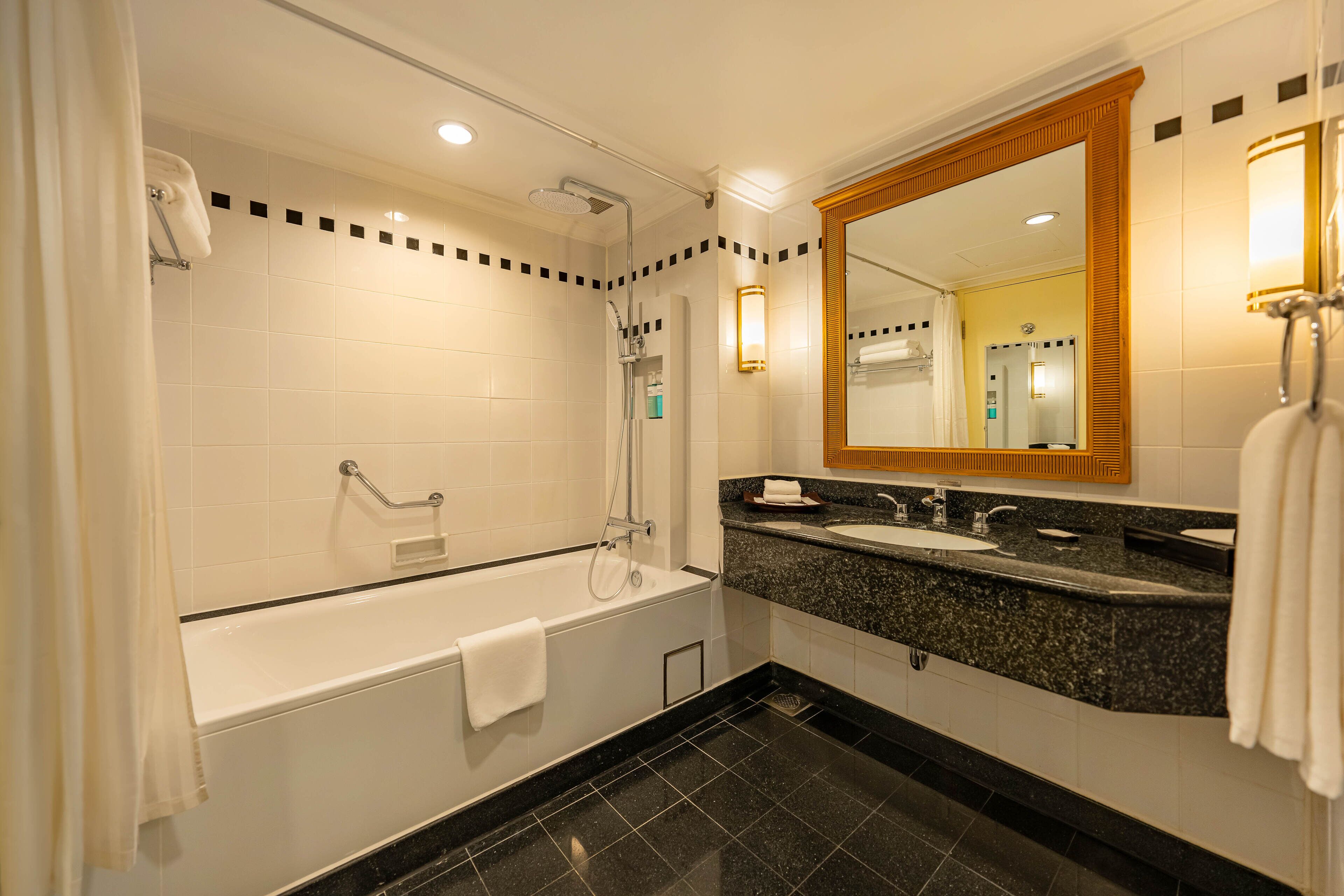 premier double or twin room | bathroom | shower, eco-friendly toiletries, hair dryer, bathrobes