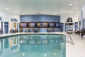 Indoor pool, open 8:00 AM to 10:00 PM, pool loungers